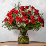 Fifty Red Roses bouquet, fifty hand-tied red roses with gypsophila and seasonal greens