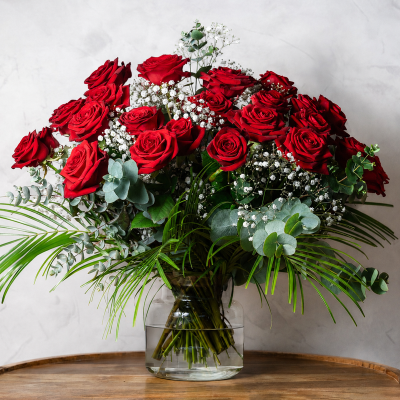 Two Dozen Red Roses bouquet, twenty-four long-stem red roses hand-tied with eucalyptus