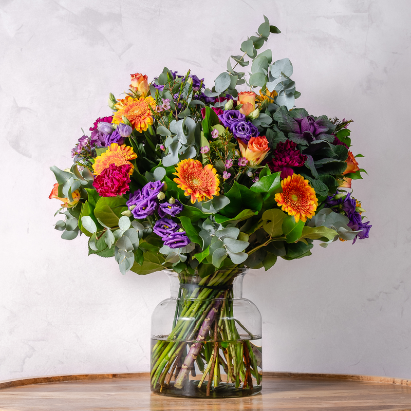 Full arrangement of Pop of Colour bouquet showing the vibrant mix of orange, purple and pink flowers available for same-day Dublin delivery