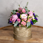 Side view of Peony Hatbox showing the luxury hatbox presentation format with peony roses and seasonal summer blooms
