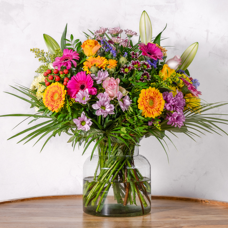 Full arrangement of Surprise bouquet showing roses, gerbera and spray chrysanthemums hand-tied by experienced florists for delivery across Ireland