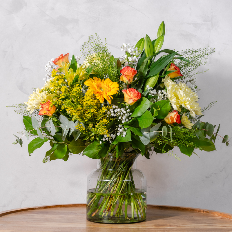 Full arrangement of You're So Golden bouquet showing warm golden flowers with salal and thlaspi available for same-day Dublin delivery