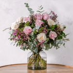 Side view of Dreamy luxury rose bouquet with salal and ecco cynarea foliage available for same-day Dublin delivery